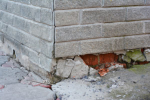 Foundation Repair - Warning Signs. House foundation repair. Foundation Repair. Broken Foundation House Brick Wall